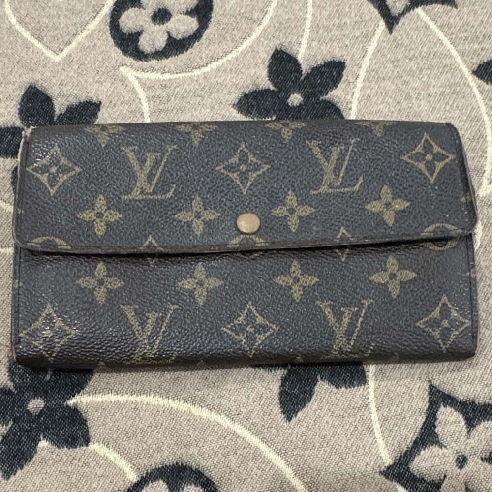 Louis Vuitton Dark Brown Monogram Wallet. Accepting reasonable offers.